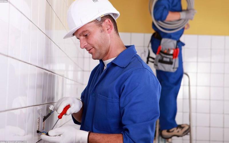Technician installing smart home panel
